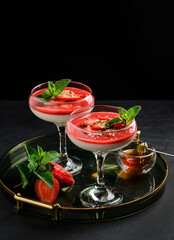 Panna cotta with strawberries and mint