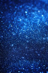 Fototapeta premium Intense Blue Glitter Sparkles in a Textured Close Up Abstract Style for a Festive Holiday Background