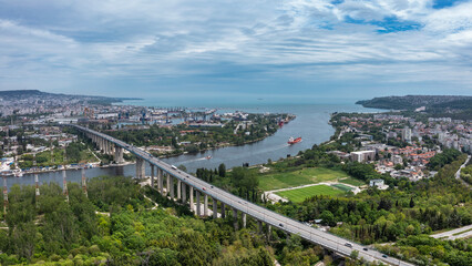 Aerial view of bridge with cars passes above the lake in Varna, Bulgaria
