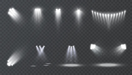 
Set of realistic spotlight beams with glowing white light on a transparent background. Studio stage lighting effects for shows, stages, photo zones, sports events or digital design.