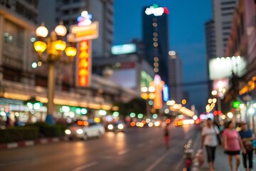 Fototapeta premium Blurred city street with vibrant nightlife and traffic