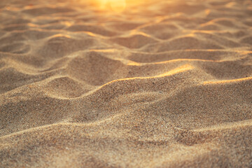 Texture of fine brown sand on the beach
