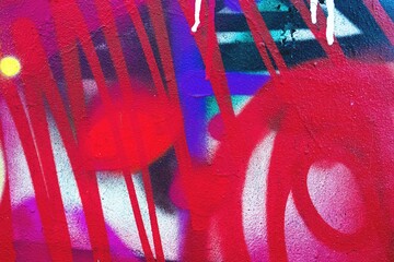 Vibrant urban graffiti art in red, blue, pink with abstract 2000s style. Bold brush strokes,...