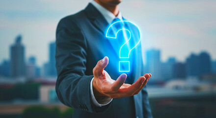 Man in suit holding a glowing question mark with city buildings blurred in the background behind him