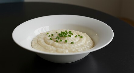 Creamy Puree in Bowl Garnished with Chives