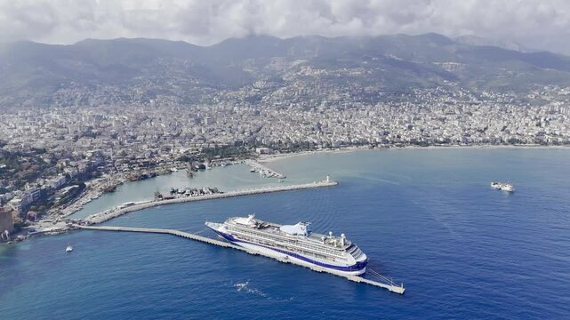 Cruise ship docks in resort town. picturesque seaport