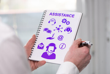 Assistance concept on a notepad