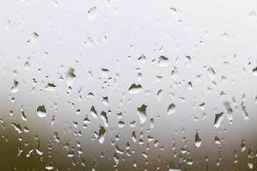 Drops of Water on a Glass Surface During a Rainy Day