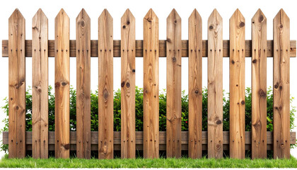 Brown wooden fence with green grass
