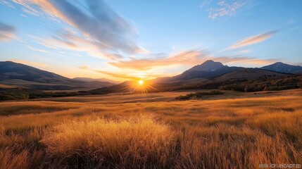 Majestic sunset illuminates rolling hills and golden grassland in a serene mountain landscape Generative AI