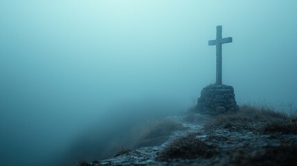Misty mountaintop cross
