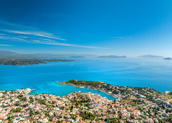 Aerial drone photo of picturesque old town of Spetses island with emerald crystal clear sea...