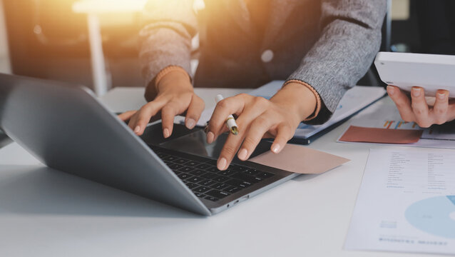 Accounting company provide finance and taxation planning for profitable cash flow, Auditor and accountant team working in office, analyze financial data and accounting record with calculator.Insight