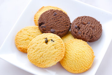 Delicious Cookies on white plate

