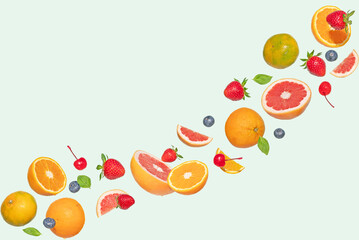 Summer fruit on a green background.  Perfect for any Summer business campaign. With the natural texture of the fruit, photographed in sunlight. Nature concept.