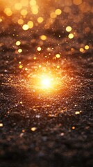 Sparkling golden light on dark surface