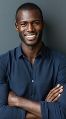 Obraz premium Confident Businessman in Deep Blue Shirt: Professional Portrait for Modern Advertising. Smiling Male Model with Crossed Arms on Gray Background. High-Resolution AI-Generated Image for Web Design and C