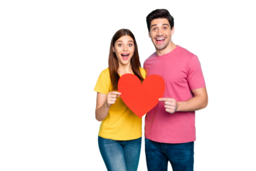 Portrait of his he her she nice attractive lovely amazed cheerful cheery couple hugging holding in hands big large heart symbol isolated over bright vivid shine vibrant green turquoise background