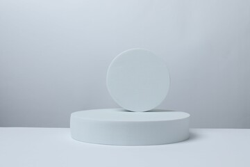 White podiums on a light background. Clean empty wall scene. Platforms vector geometric design