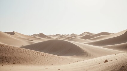Expansive Desert Landscape with Undulating Sand Dunes Under Bright Sunlight