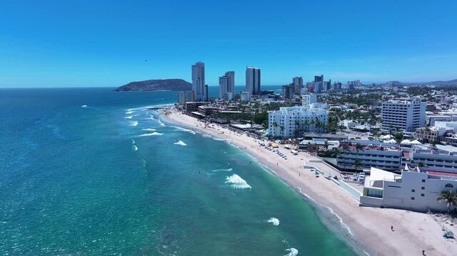 Aerial Mexico Mazatlan beach resort vacation 2. Seaport cargo, automobiles, fishing and cruise ships. Luxury resort Mexican Riviera. Ocean tropical vacation business. Beach recreation. m