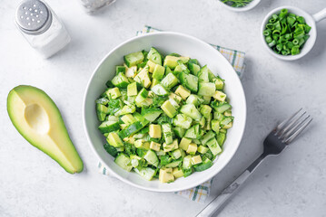 Avocado cucumber salad in a bowl
