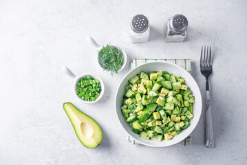 Avocado cucumber salad in a bowl