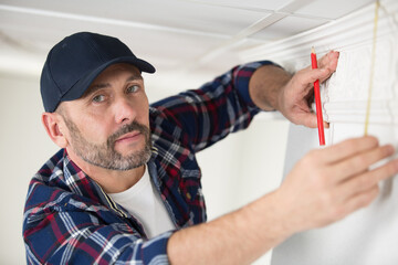 a man worker with venetian plaster