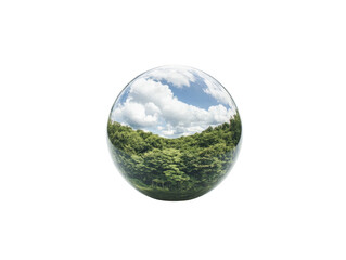 Forest reflection in glass sphere with blue sky and clouds