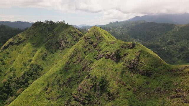 Aerial panning panorama Adam Peak Hilltop - Sri Lanka&rsquo;s Sacred Mountain. Breathtaking view from the summit of Adam Peak or Sri Pada, Sri Lanka sacred mountain
