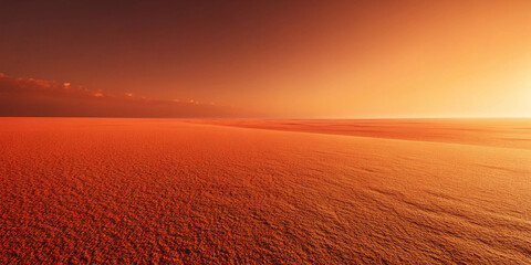 Fototapeta premium Golden desert landscape with rippled sand and calm water at sunset in warm orange light, serene nature travel background.