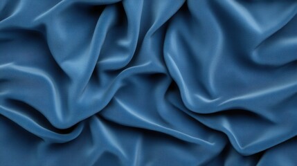 Obraz premium Draped blue fabric, smooth texture, soft folds.