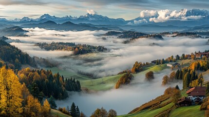 Obraz premium A beautiful mountain scene is covered in fog, as seen from above. 