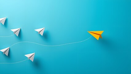 Unique Orange Paper Airplane Leading White Ones on Blue Background