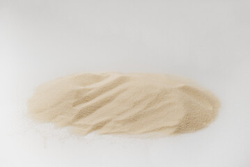 Desert sand pile, dune isolated on white, with clipping path, side view