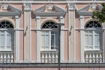 Fototapeta na wymiar Ornate historic building facade with pastel colors.