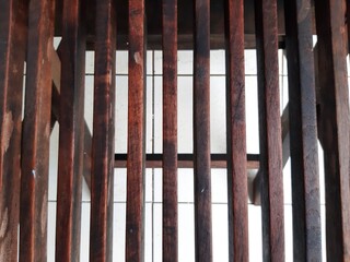 Fototapeta premium wooden chair gets wet in the rain