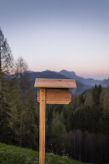 Blank Wooden Signpost on Mountain Background for Mockup