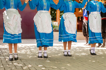 Dancers in Traditional Moldovan Dress During a Typical Dance