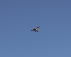 Seaplane flying over Seattle skyline