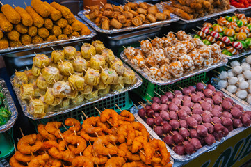 Fish and meat mix barbecue close up in South East Asian food market