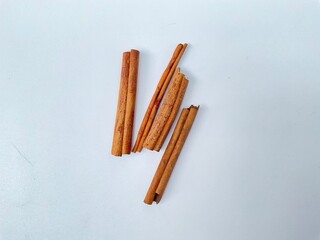 cinnamon sticks isolated on white