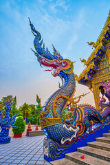 Colorful Naga serpents at Viharn Hall of Blue Temple, Chiang Rai, Thailand