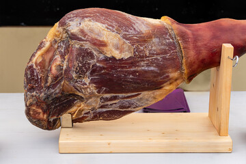 Iberian ham pata negra from Spain. hamon on the table, big foot. jamon is the national dish of...