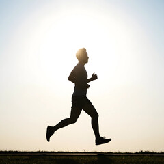 silhouette of a man running