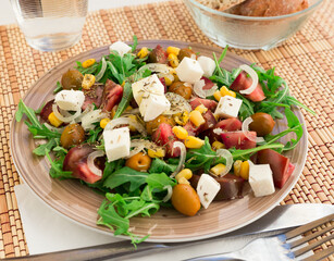 Fresh vegetarian healthy vegetable salad with arugula and chees