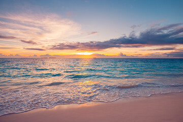 Closeup sea sand beach. Perfect beach landscape. Inspire tropical empty seascape horizon. Colorful vibrant sunset sky. Calm tranquil relax amazing sunlight, summer vacation travel holiday wallpaper