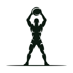 Powerful Silhouette of a Man Lifting a Medicine Ball in a Strength Training Pose