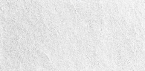 Obraz premium A close-up view of crumpled white paper texture showcasing various folds and creases. ideal for backgrounds. design projects. or artistic compositions