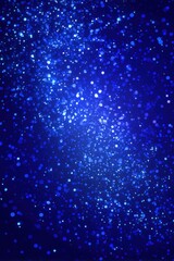 Obraz premium Abstract bokeh lights background in blue tones with sparkling effect and blurred motion for festive designs and wallpapers